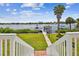 Steps lead down to a private dock with water access at 644 Bayshore Dr, Tarpon Springs, FL 34689