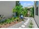 Private backyard oasis with gravel pathway and seating area at 160 26Th N Ave, St Petersburg, FL 33704