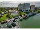 Waterfront condo complex featuring a marina, pool, tennis courts, and stunning views at 660 Island Way # 301, Clearwater Beach, FL 33767
