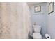 Small bathroom with a toilet and shower at 1730 Manasota Beach Rd # 115, Englewood, FL 34223