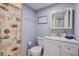 Clean bathroom with single vanity, toilet, and shower/tub combo at 1730 Manasota Beach Rd # 115, Englewood, FL 34223