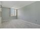 Bedroom with window and carpet flooring at 660 Island Way # 301, Clearwater Beach, FL 33767