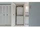 Stackable washer and dryer in a convenient laundry closet at 660 Island Way # 301, Clearwater Beach, FL 33767