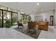 Spacious common area with leather couches and large windows at 660 Island Way # 301, Clearwater Beach, FL 33767