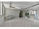 Condo lobby with tiled floor and comfortable seating at 660 Island Way # 301, Clearwater Beach, FL 33767