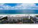 Aerial view of building, beach, and ocean at 4450 Gulf Blvd # 104, St Pete Beach, FL 33706