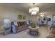 Spacious living area with hardwood floors and open floor plan at 4450 Gulf Blvd # 104, St Pete Beach, FL 33706