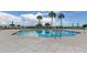 Relaxing pool area with ocean views and comfortable seating at 4450 Gulf Blvd # 104, St Pete Beach, FL 33706