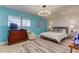 Bright bedroom with a comfortable bed and stylish decor at 4450 Gulf Blvd # 104, St Pete Beach, FL 33706