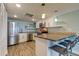 Modern kitchen with stainless steel appliances and island at 4450 Gulf Blvd # 104, St Pete Beach, FL 33706