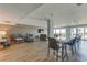 Common area with seating, dining table, and ocean view at 4450 Gulf Blvd # 104, St Pete Beach, FL 33706
