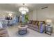 Open concept living area with dining space and kitchen views at 4450 Gulf Blvd # 104, St Pete Beach, FL 33706