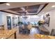 Spacious dining area with unique ceiling detail and access to backyard at 5501 Bates St, Seminole, FL 33772