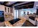 Bright kitchen with stainless steel appliances and exposed beams at 5501 Bates St, Seminole, FL 33772