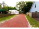 Brick driveway leading to garage and house at 5501 Bates St, Seminole, FL 33772