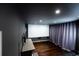 Home theater room with large projection screen and comfortable seating at 5501 Bates St, Seminole, FL 33772