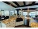 Kitchen with farmhouse sink and exposed beams at 5501 Bates St, Seminole, FL 33772