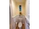 Clean bathroom with toilet, built-in shelving, and a beachy vibe at 5501 Bates St, Seminole, FL 33772