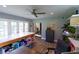 Craft room with cutting table, desk, and plenty of storage at 5501 Bates St, Seminole, FL 33772