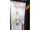 Simple, updated half bathroom with white door at 5501 Bates St, Seminole, FL 33772