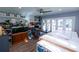 Spacious craft room with ample workspace, large windows, and built-in storage at 5501 Bates St, Seminole, FL 33772