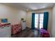 Bright bedroom featuring French doors opening to the backyard at 5501 Bates St, Seminole, FL 33772