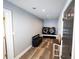 Convenient laundry room with washer, dryer, and built-in bench at 5501 Bates St, Seminole, FL 33772