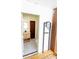 Small half bath with wood vanity and access to exterior at 5501 Bates St, Seminole, FL 33772