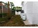 Side yard with propane tank and access to pool area at 5501 Bates St, Seminole, FL 33772
