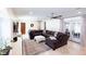Comfortable living room, featuring a sectional sofa and French doors at 5501 Bates St, Seminole, FL 33772