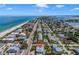 Aerial view showing beach, road, and property location at 1809 Gulf Blvd, Indian Rocks Beach, FL 33785