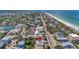 Aerial view of home near beach and main road at 1809 Gulf Blvd, Indian Rocks Beach, FL 33785