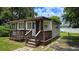 Quaint single-story home with a wooden deck at 2805 58Th N Pl, St Petersburg, FL 33714