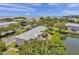 Aerial view of waterfront property, showing building and canal at 5157 Beach Se Dr # C, St Petersburg, FL 33705