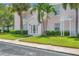 Pink building exterior with landscaping and entrance at 5157 Beach Se Dr # C, St Petersburg, FL 33705