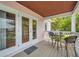 Private balcony with seating and access to the interior at 5157 Beach Se Dr # C, St Petersburg, FL 33705