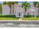 Pink building exterior with landscaping and entrance at 5157 Beach Se Dr # C, St Petersburg, FL 33705