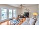 Living room with water views and access to a private balcony at 5157 Beach Se Dr # C, St Petersburg, FL 33705