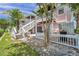 Exterior of the property showing patio and landscaping at 5157 Beach Se Dr # C, St Petersburg, FL 33705