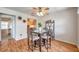 Cozy dining area with a glass-top table and four chairs at 5157 Beach Se Dr # C, St Petersburg, FL 33705