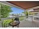 Relaxing balcony with water views and small table at 5157 Beach Se Dr # C, St Petersburg, FL 33705
