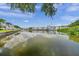 Calm water view with boats and waterfront property at 5157 Beach Se Dr # C, St Petersburg, FL 33705