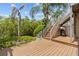 Private deck with stairs leading down to the backyard at 4336 Spinnaker Cove Ln, Tampa, FL 33615