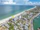 Aerial view of beachfront property and surroundings at 403 Gulf Way # 302, St Pete Beach, FL 33706