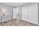 Bedroom with grey dresser and double door closet at 403 Gulf Way # 302, St Pete Beach, FL 33706