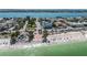 Aerial perspective highlighting the property's beachfront location and neighborhood at 403 Gulf Way # 302, St Pete Beach, FL 33706