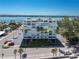 Aerial view of beachfront condo building, highlighting its location at 403 Gulf Way # 302, St Pete Beach, FL 33706