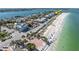 Aerial view highlighting condo location near beach and local businesses at 403 Gulf Way # 302, St Pete Beach, FL 33706