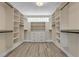 Spacious walk-in closet with ample shelving at 1200 Eden Isle Ne Blvd, St Petersburg, FL 33704