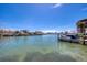 Scenic waterfront view with boats and a dock at 400 Larboard Way # 106, Clearwater Beach, FL 33767